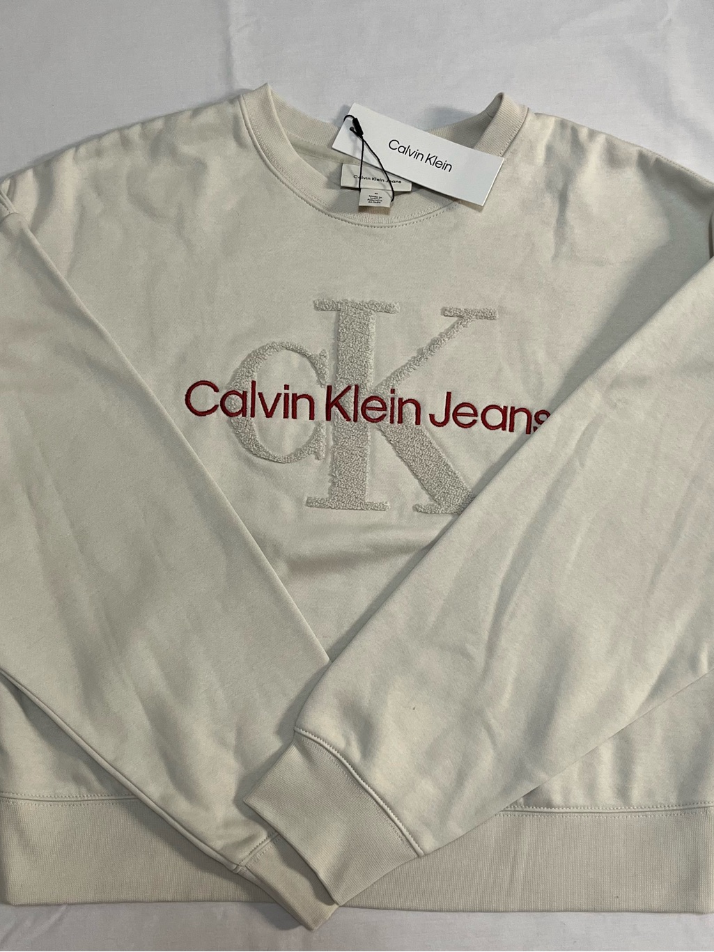 Calvin Klein Men’s Cream Crewneck With Red Logo